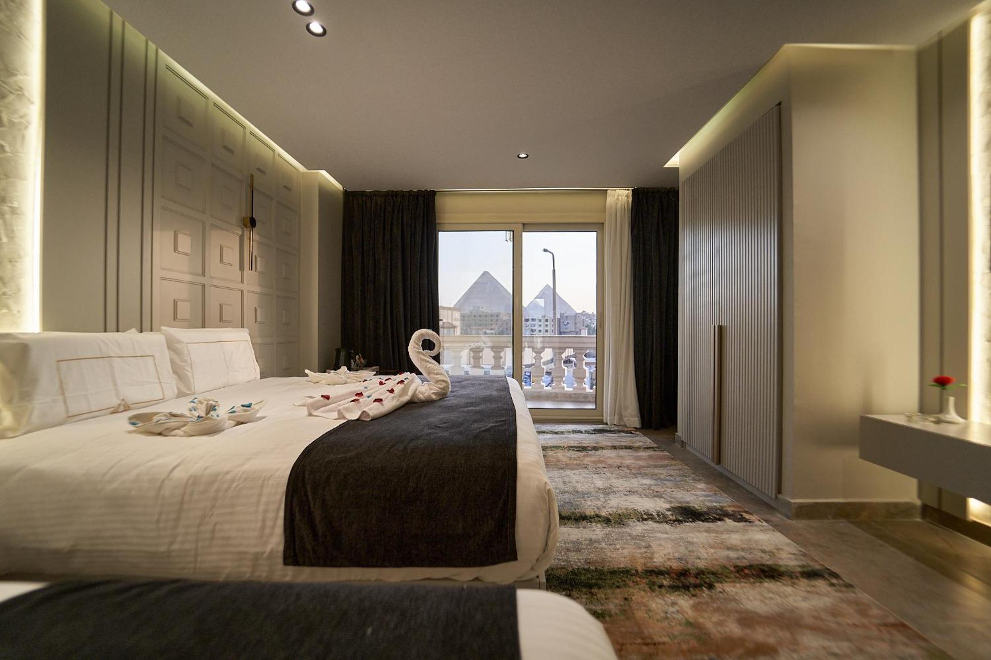 Pyramids Charm Hotel Al Kawm al Akhdar Extérieur photo