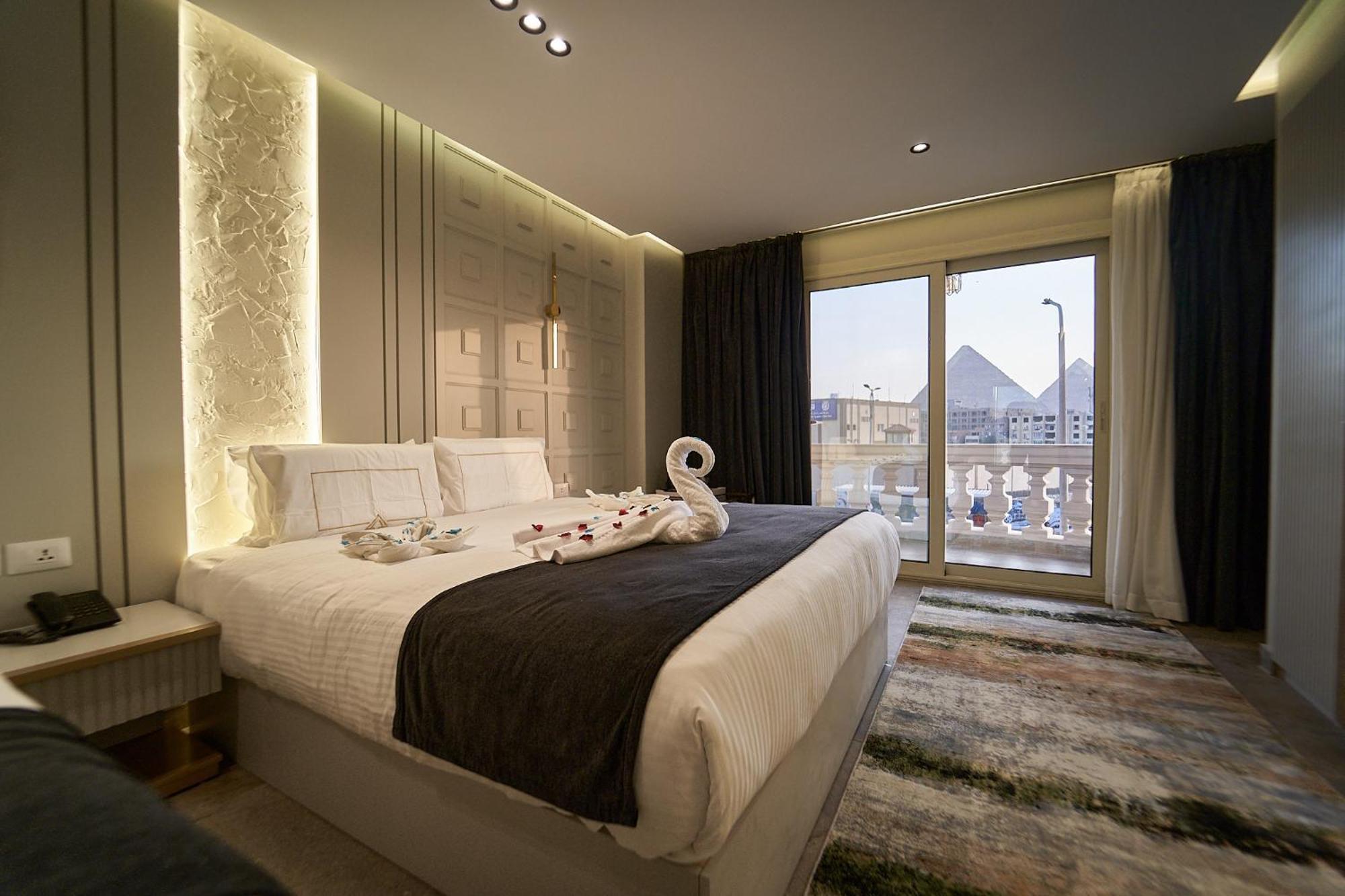 Pyramids Charm Hotel Al Kawm al Akhdar Extérieur photo