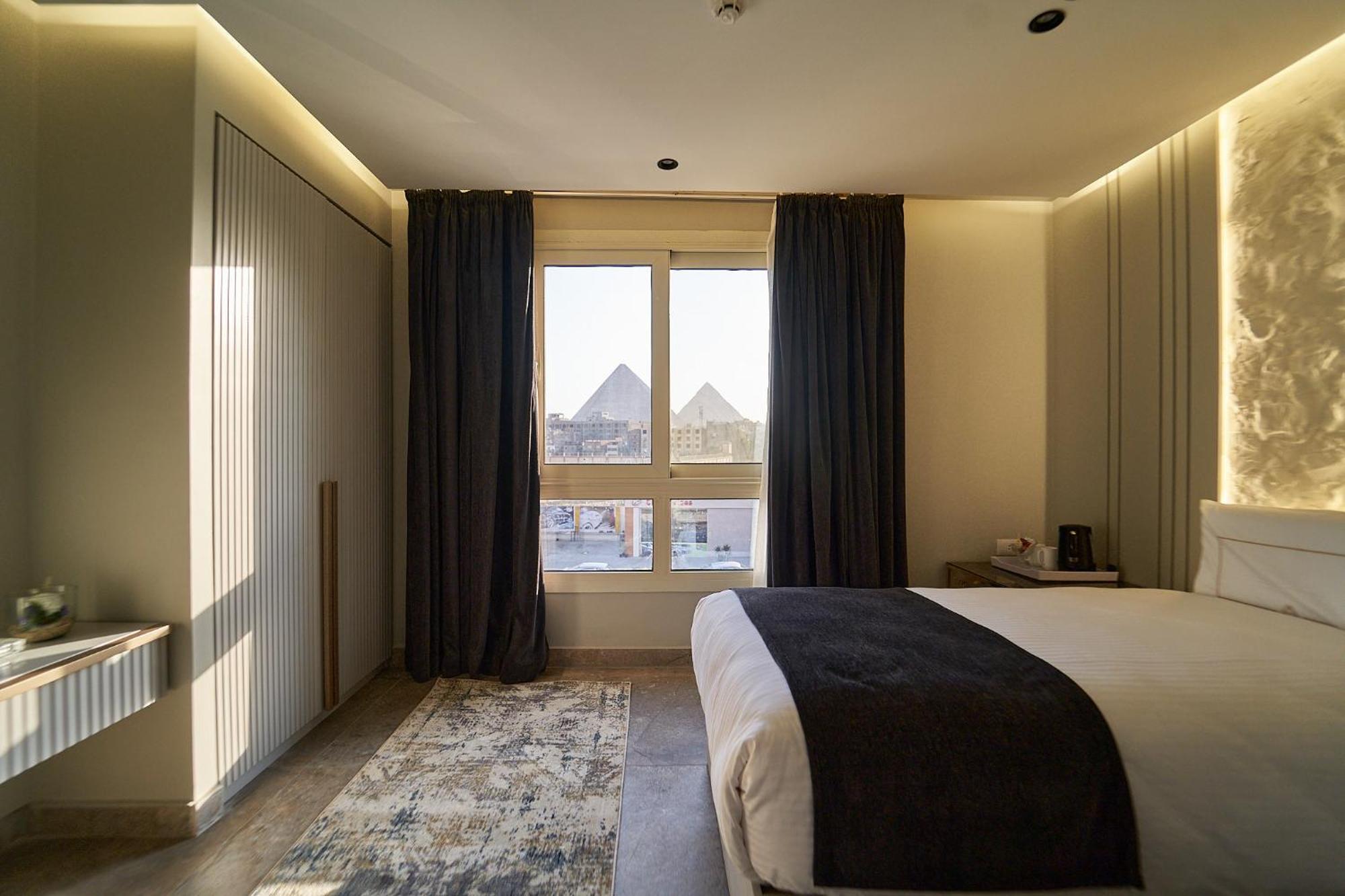 Pyramids Charm Hotel Al Kawm al Akhdar Extérieur photo