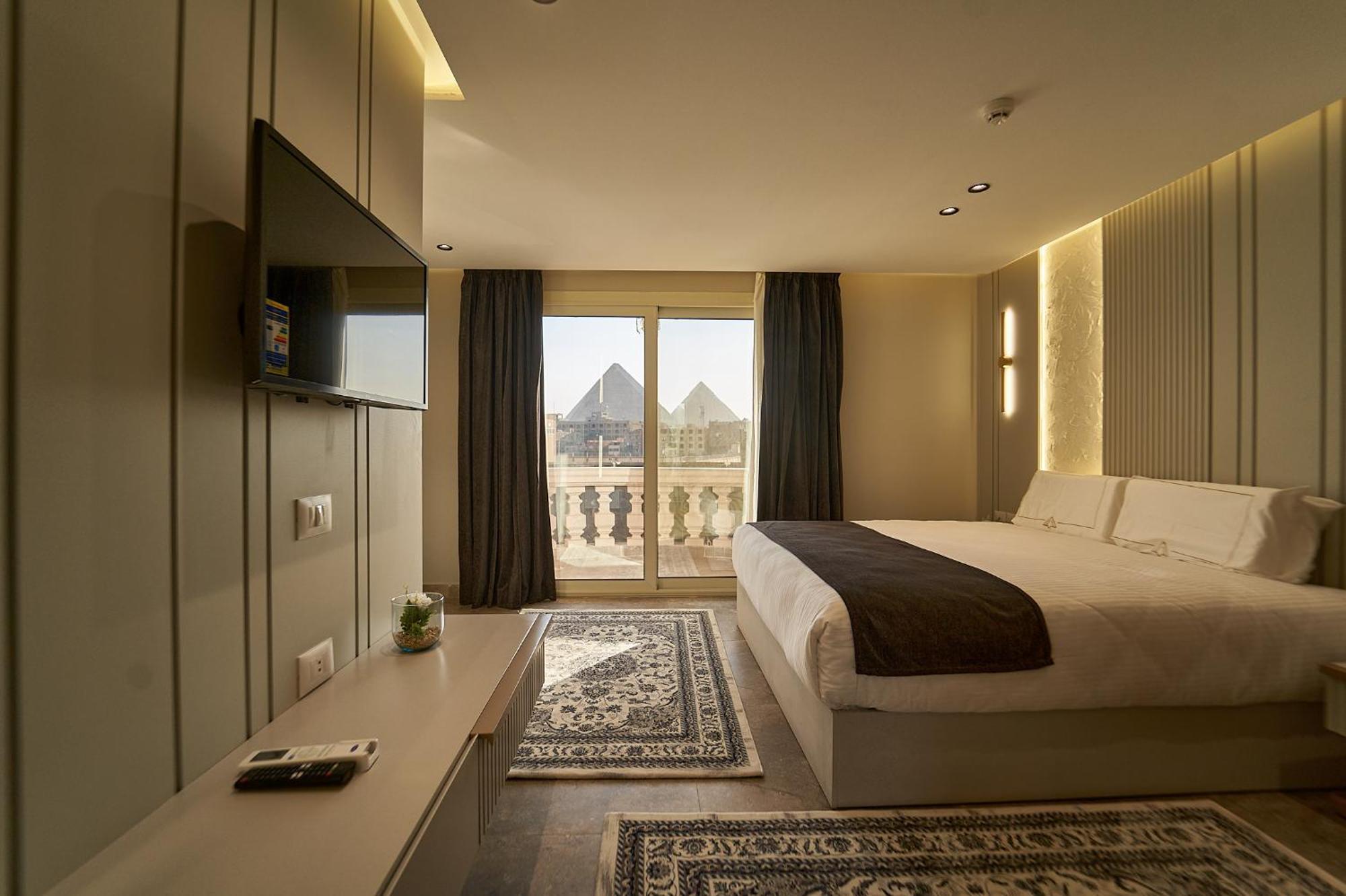 Pyramids Charm Hotel Al Kawm al Akhdar Extérieur photo