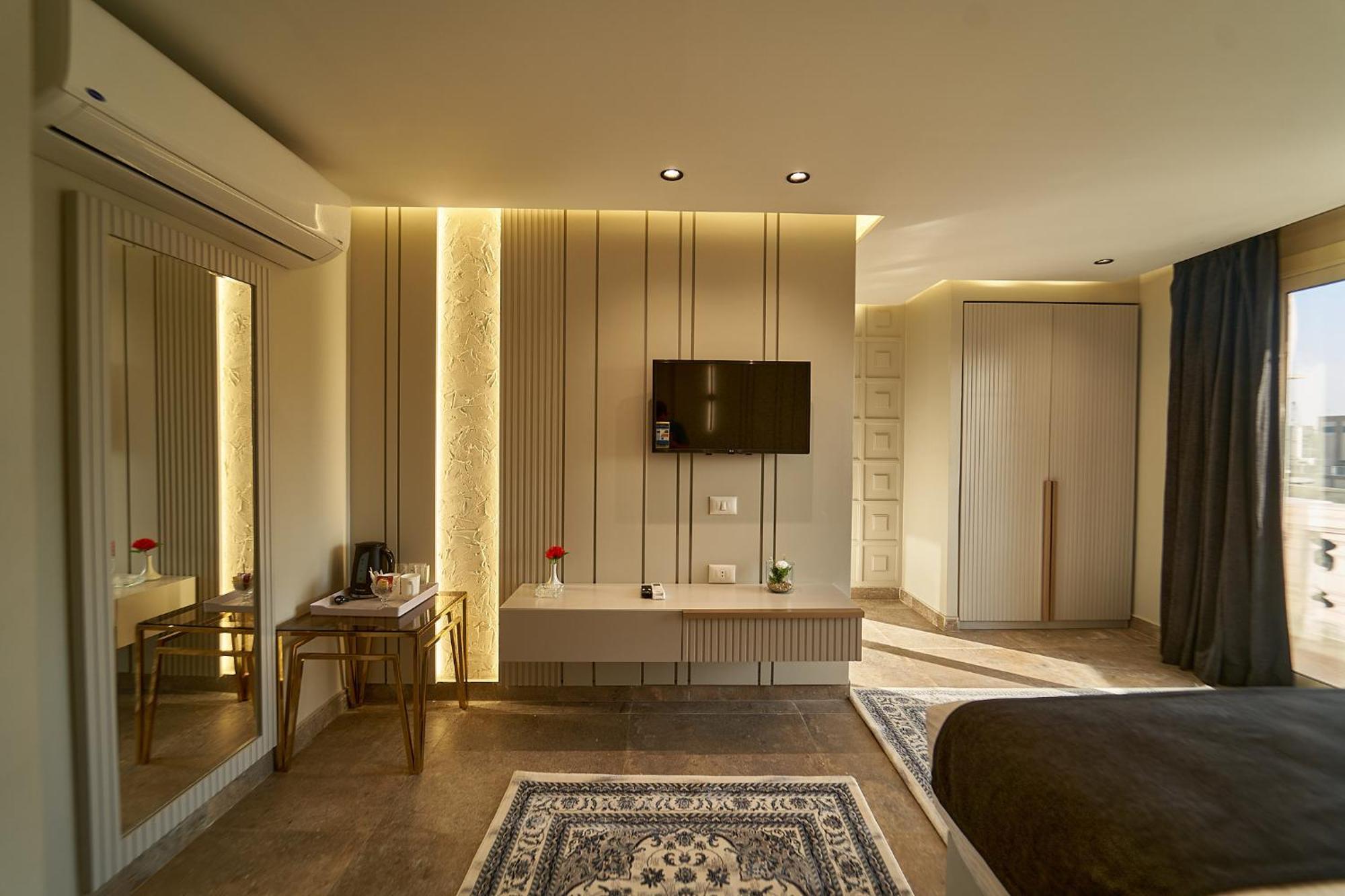 Pyramids Charm Hotel Al Kawm al Akhdar Extérieur photo