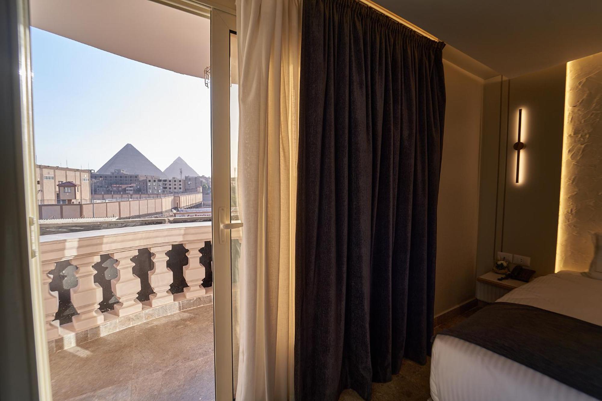 Pyramids Charm Hotel Al Kawm al Akhdar Extérieur photo