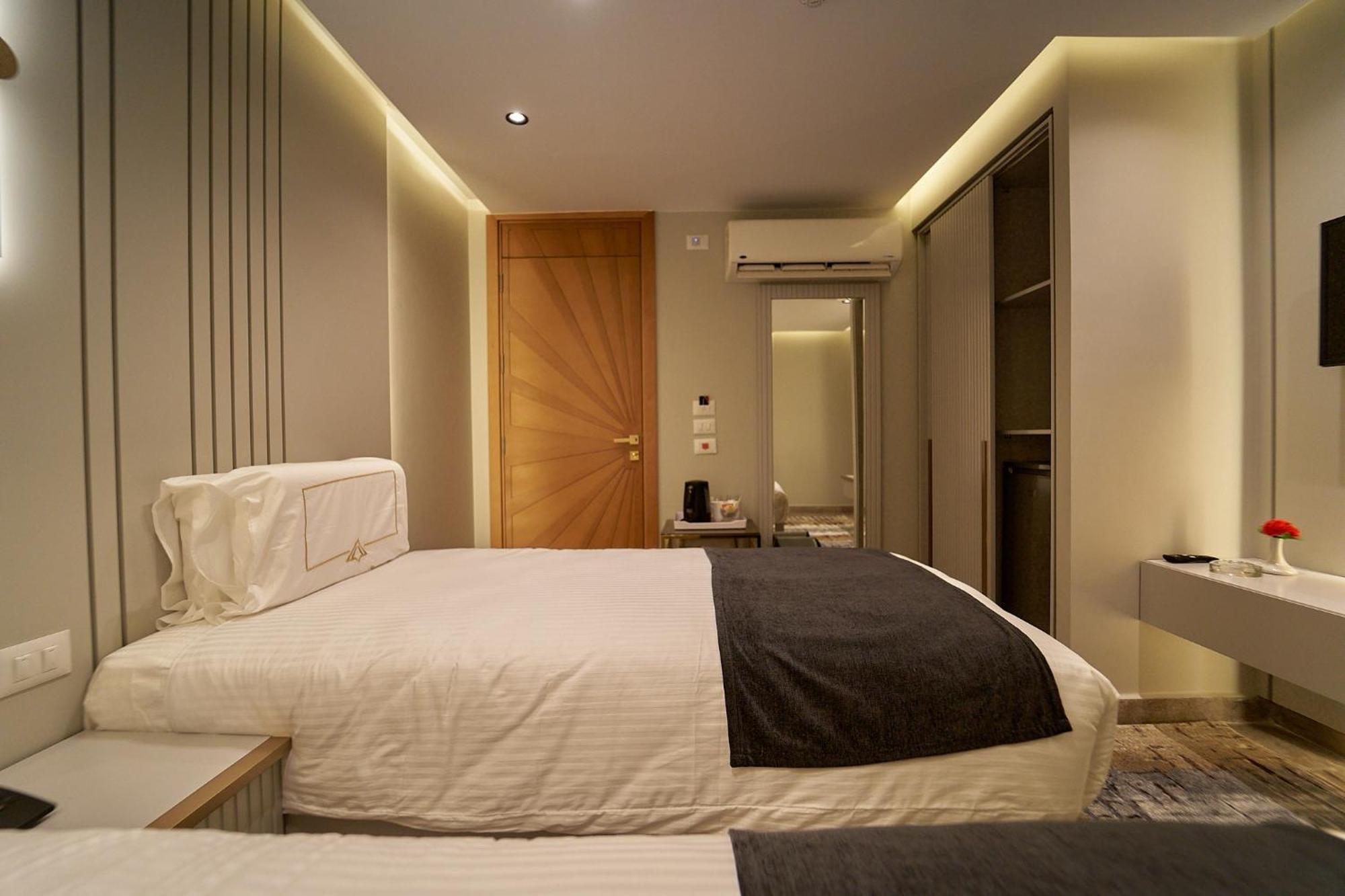 Pyramids Charm Hotel Al Kawm al Akhdar Extérieur photo