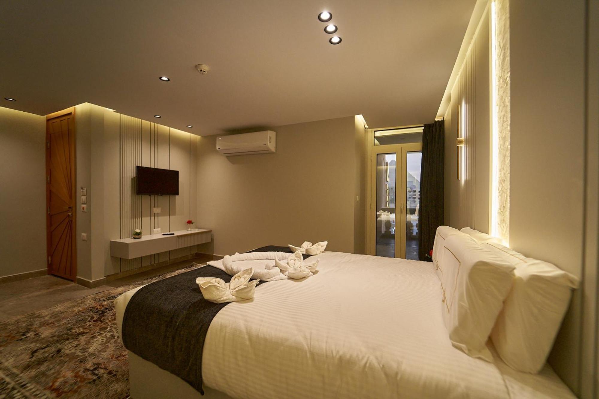 Pyramids Charm Hotel Al Kawm al Akhdar Extérieur photo