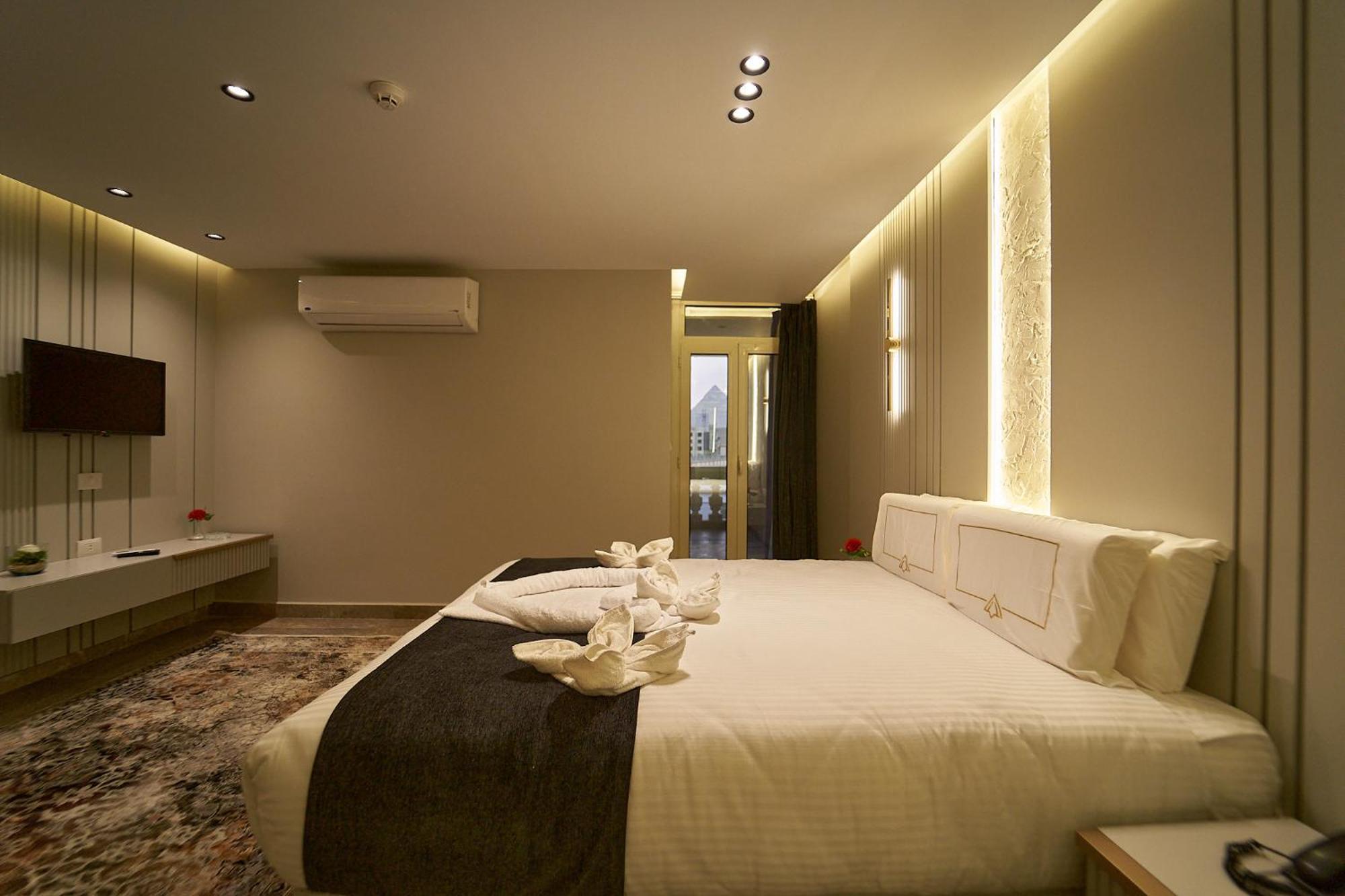 Pyramids Charm Hotel Al Kawm al Akhdar Extérieur photo