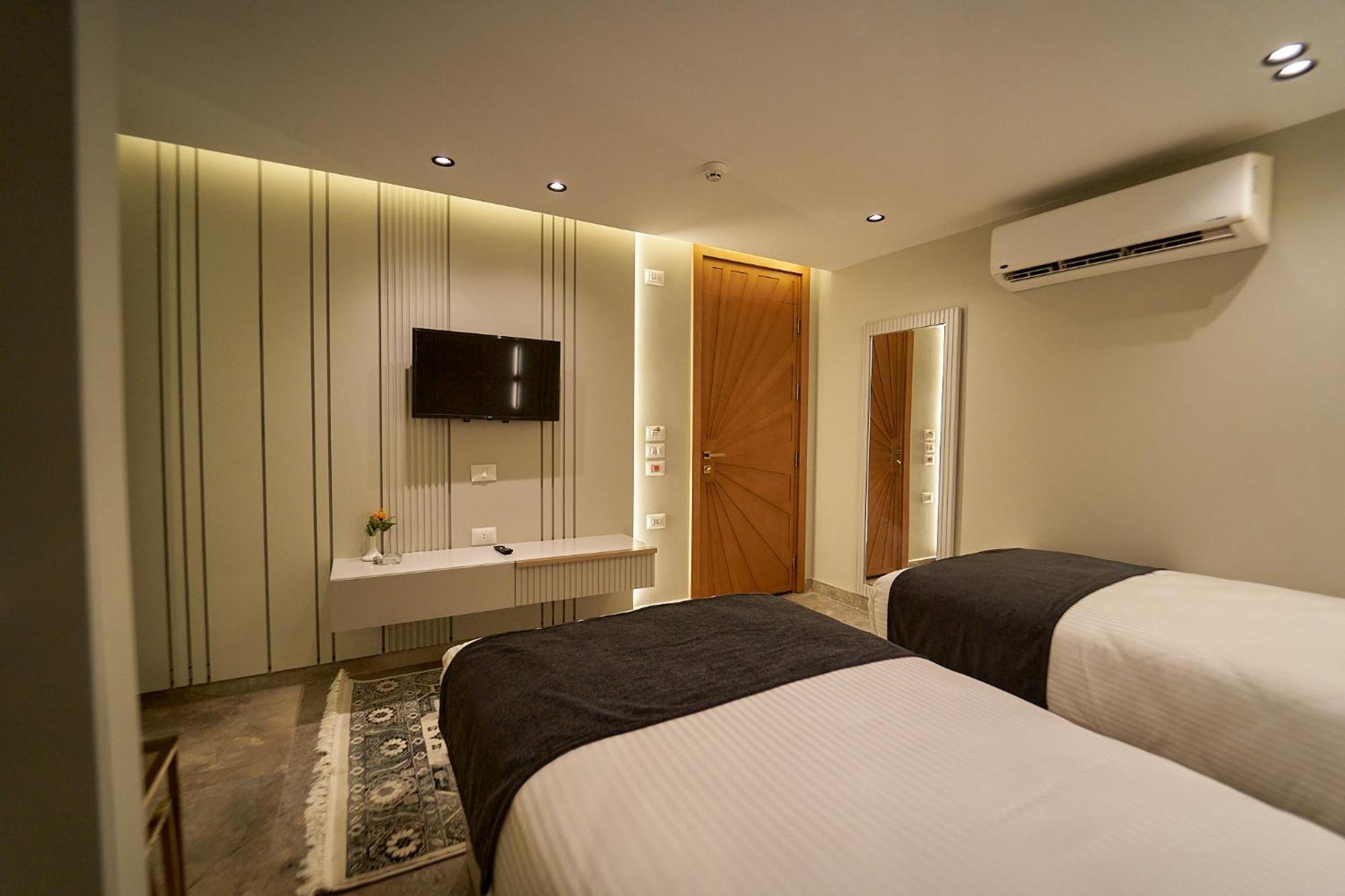 Pyramids Charm Hotel Al Kawm al Akhdar Extérieur photo