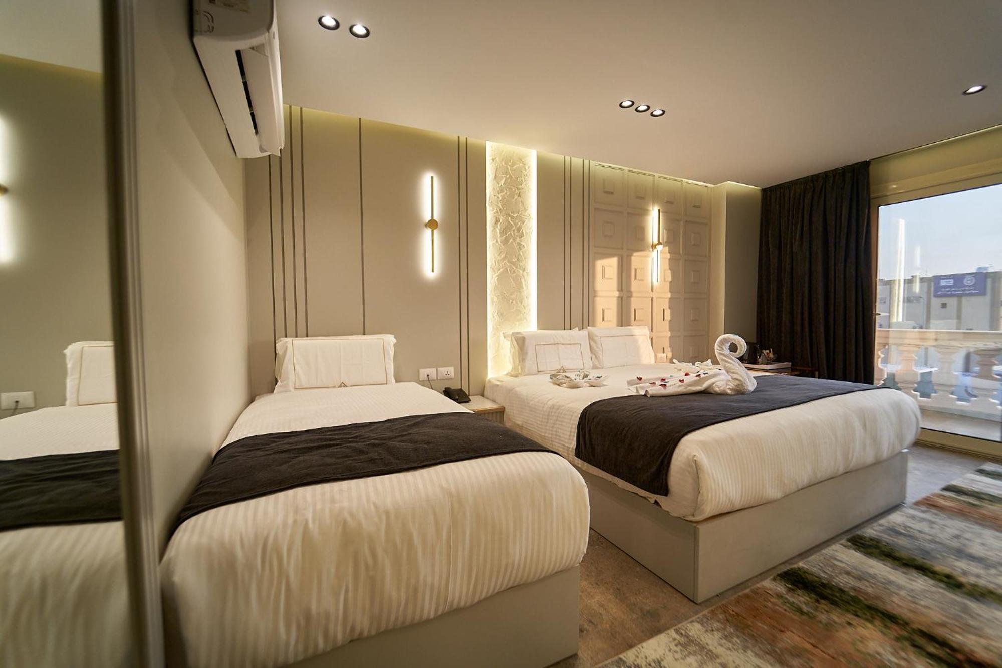 Pyramids Charm Hotel Al Kawm al Akhdar Extérieur photo