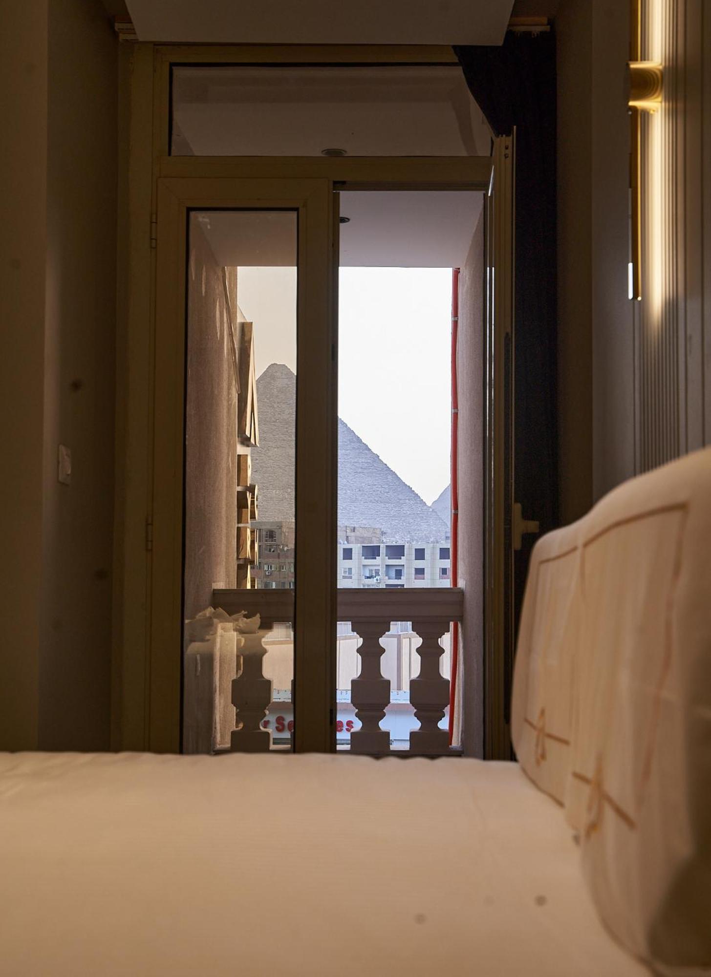 Pyramids Charm Hotel Al Kawm al Akhdar Extérieur photo