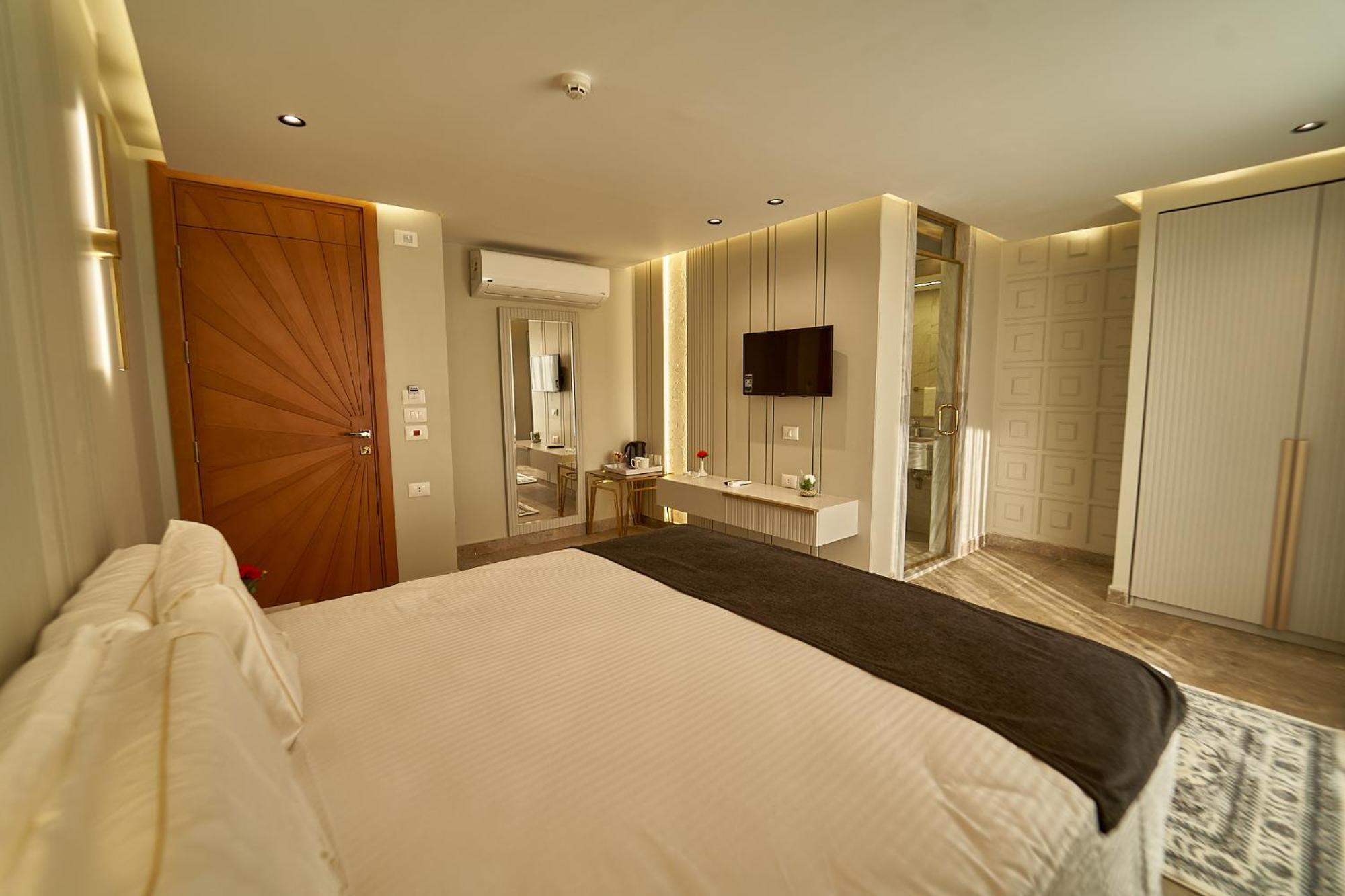 Pyramids Charm Hotel Al Kawm al Akhdar Extérieur photo