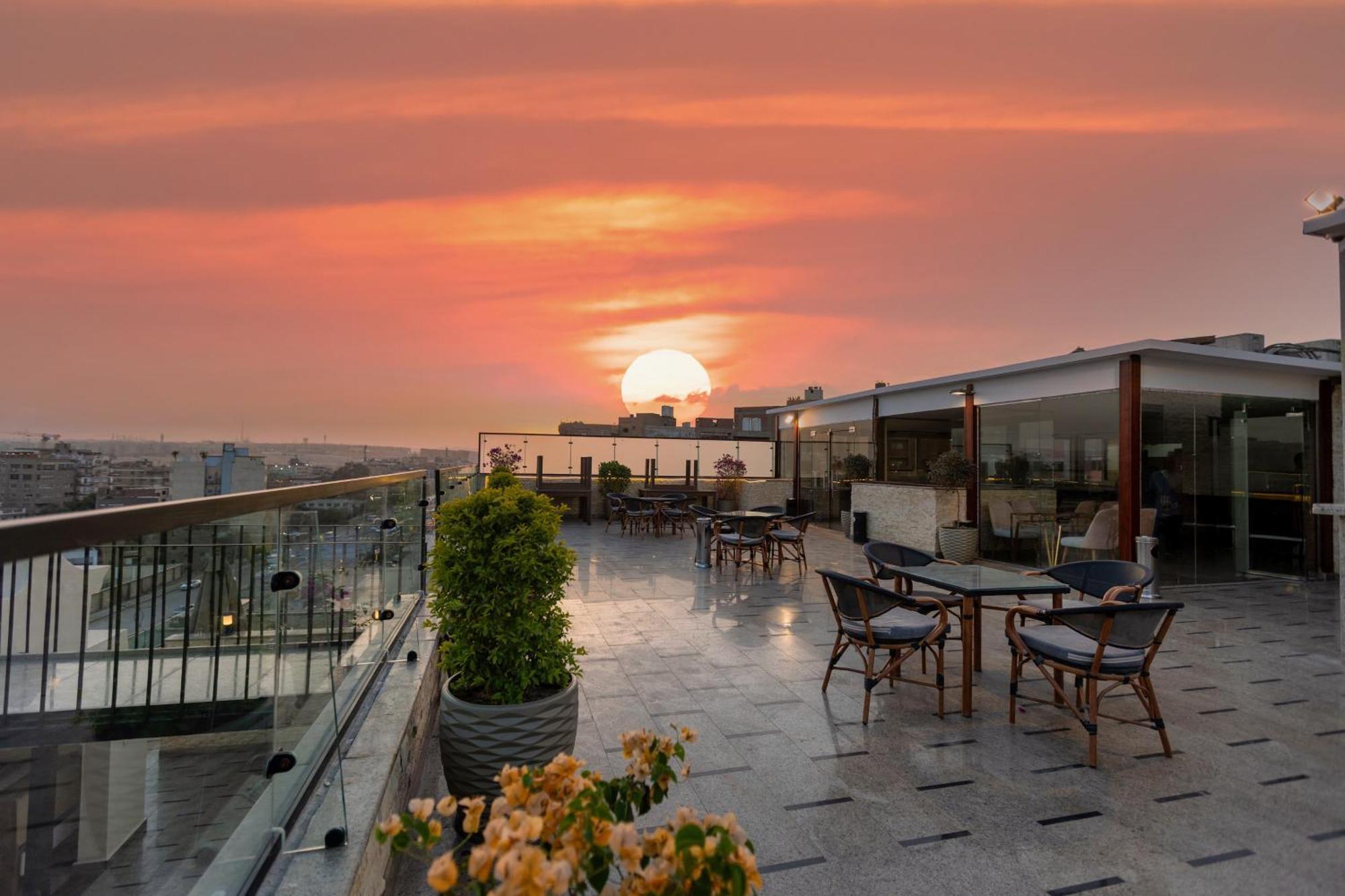 Pyramids Charm Hotel Al Kawm al Akhdar Extérieur photo